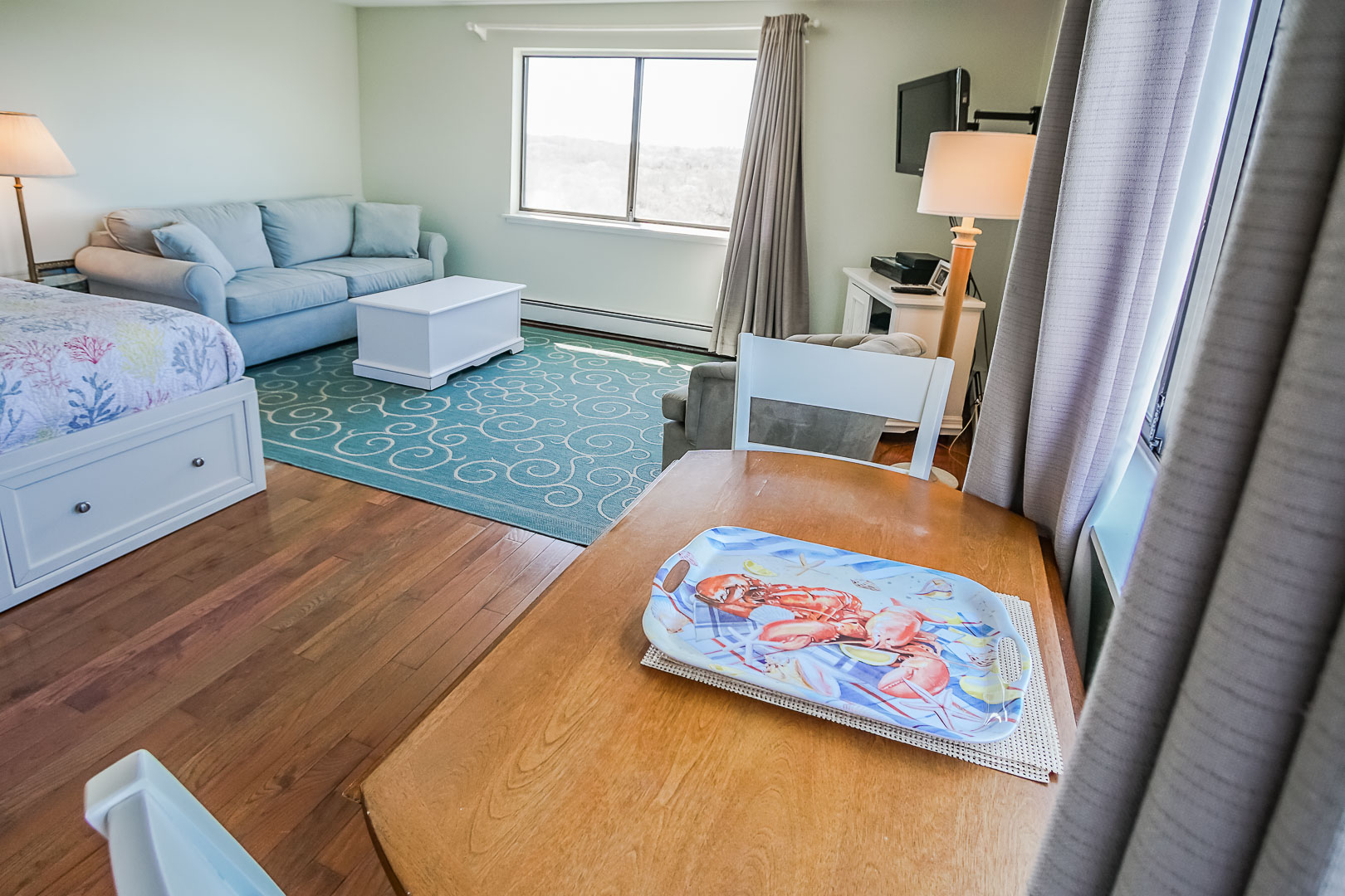 A modern bedroom at VRI's Neptune House Resort in Rhode Island.